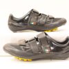High-performance black cycling shoes with adjustable straps and rigid soles for optimal efficiency.