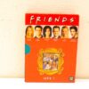 Friends Season 9 DVD box set featuring vibrant art and beloved cast photos, celebrating friendship.