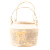 Rustic vintage metal pot with a worn handle, showcasing unique textures and rich history.