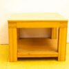 Elegant minimalist wooden table with open shelf, perfect for versatile and functional living spaces.