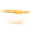 Elegant white bowl with a golden rim, perfect for serving or as a decorative piece.