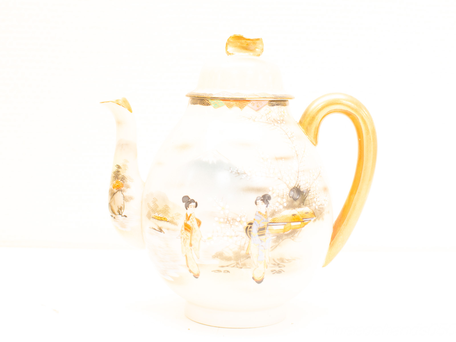 Elegant teapot with Japanese women in kimonos and serene landscapes, perfect for collectors.