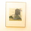 Tranquil windmill in a peaceful rural landscape, showcasing traditional craftsmanship and natural beauty.