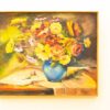 Vibrant floral bouquet in a blue vase, radiating warmth and tranquility in natures beauty.