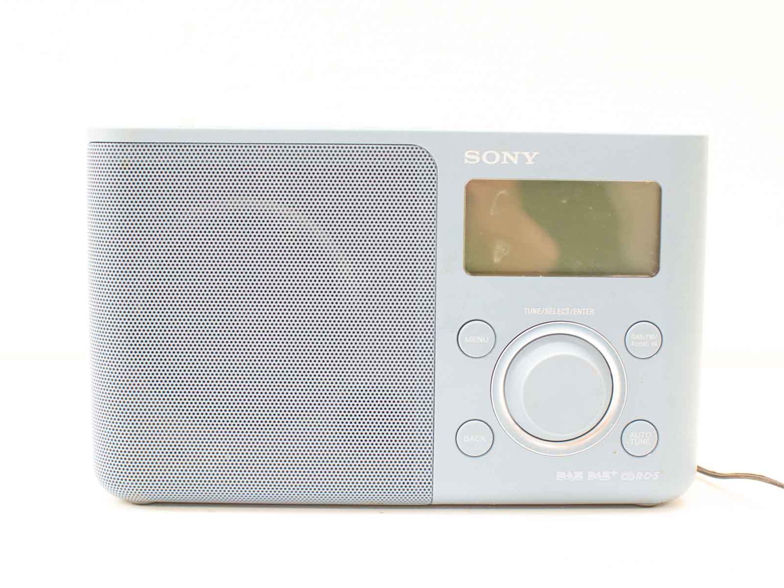 Sleek gray Sony radio with digital display and intuitive controls for modern living spaces.