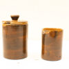 Handmade glossy brown ceramic container and creamer set for stylish kitchen decor.