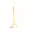 Elegant golden standing lamp with ornate details and a warm, inviting glow for stylish décor.