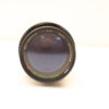 Vintage telephoto lens with precise controls for focus and aperture, perfect for serious photographers.