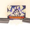 Vintage Triominos De Luxe board game with colorful triangular pieces for strategic fun.