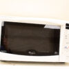 Sleek white Whirlpool microwave with glass door and intuitive controls, perfect for quick meal prep.
