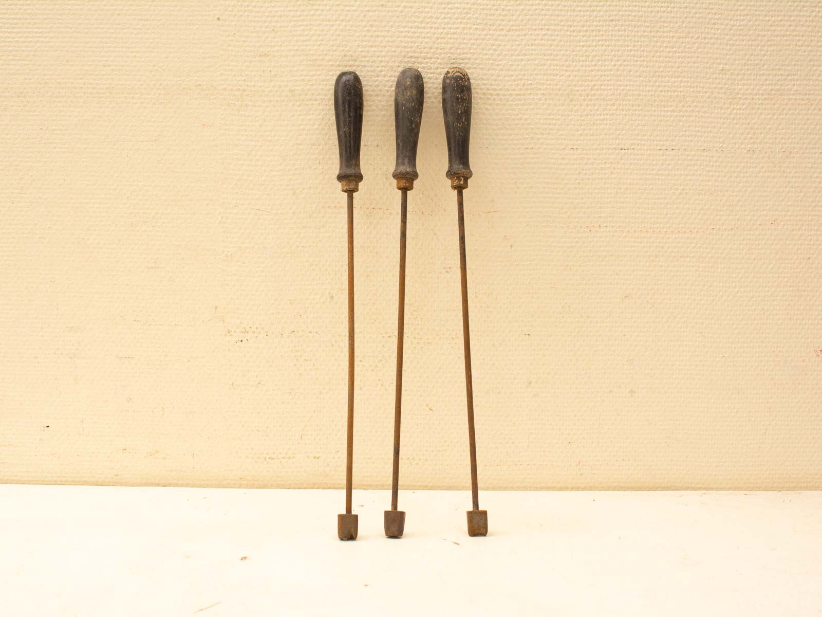 Vintage Craft Tools with Wooden Handles and Square Metal Tips