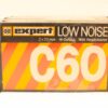 Vintage Expert C60 cassette tape, low noise, 60 minutes, vibrant design, perfect for audio enthusiasts.