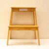 Elegant bamboo step stool with natural grain, lightweight design, and eco-friendly appeal.