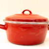 Quality vintage red cooking pot, perfect for stews and soups, with durable handles and lid.