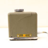 Olive green vintage Crown slide projector, embodying mid-century charm and nostalgia for collectors.