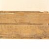 Rustic wooden crate with vintage inscriptions, showcasing durable craftsmanship and nostalgic charm.