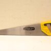Ergonomic Yellow-Black Hand Saw for Efficient Woodworking and DIY Projects