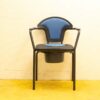 Modern blue chair with black metal frame and hidden storage for home or office use.