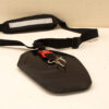 Durable water sports accessory with adjustable harness and secure clip for kayaking and windsurfing.