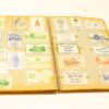 Nostalgic scrapbook of vintage restaurant and hotel business cards from the Netherlands.