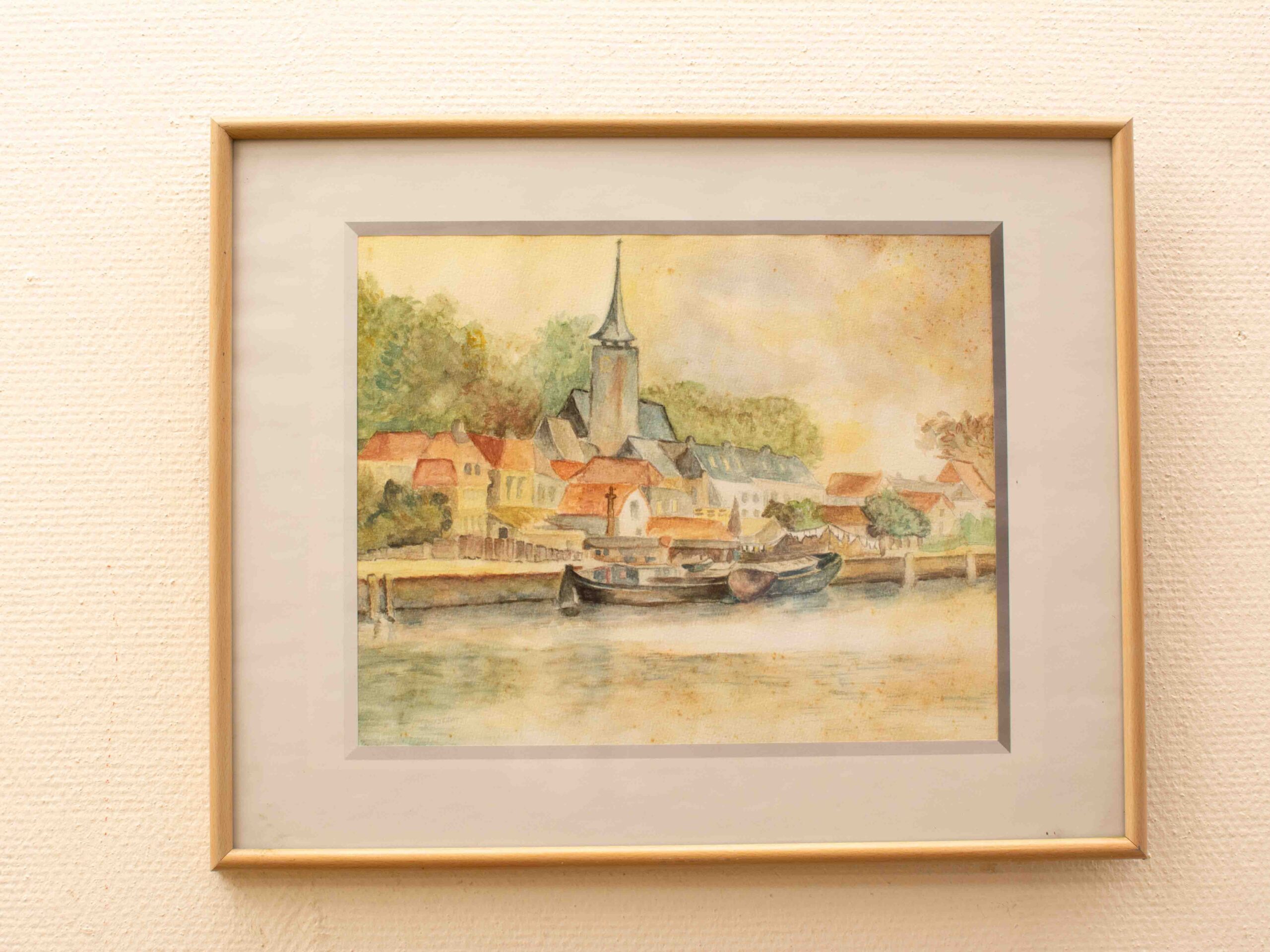 Prent van een dorpje bij het water 38606