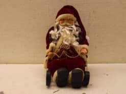 Kerstman zittend op de slee 44377