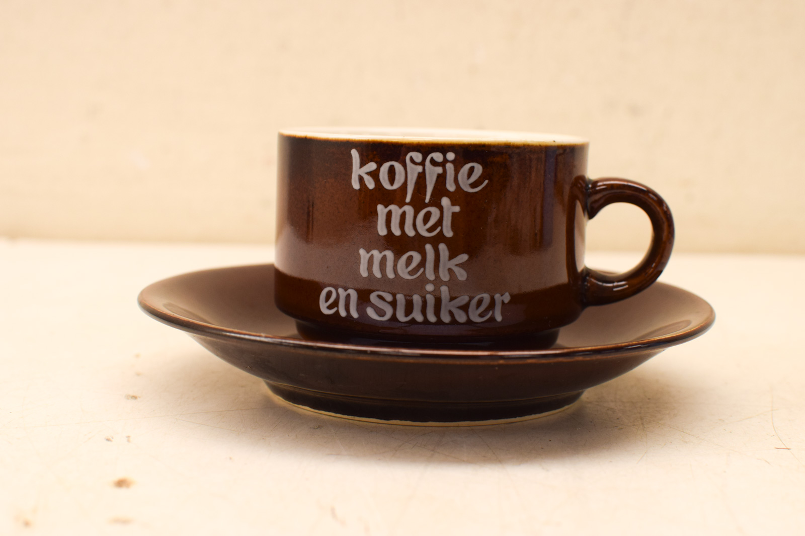 Porseleinen kop en schotel   44543