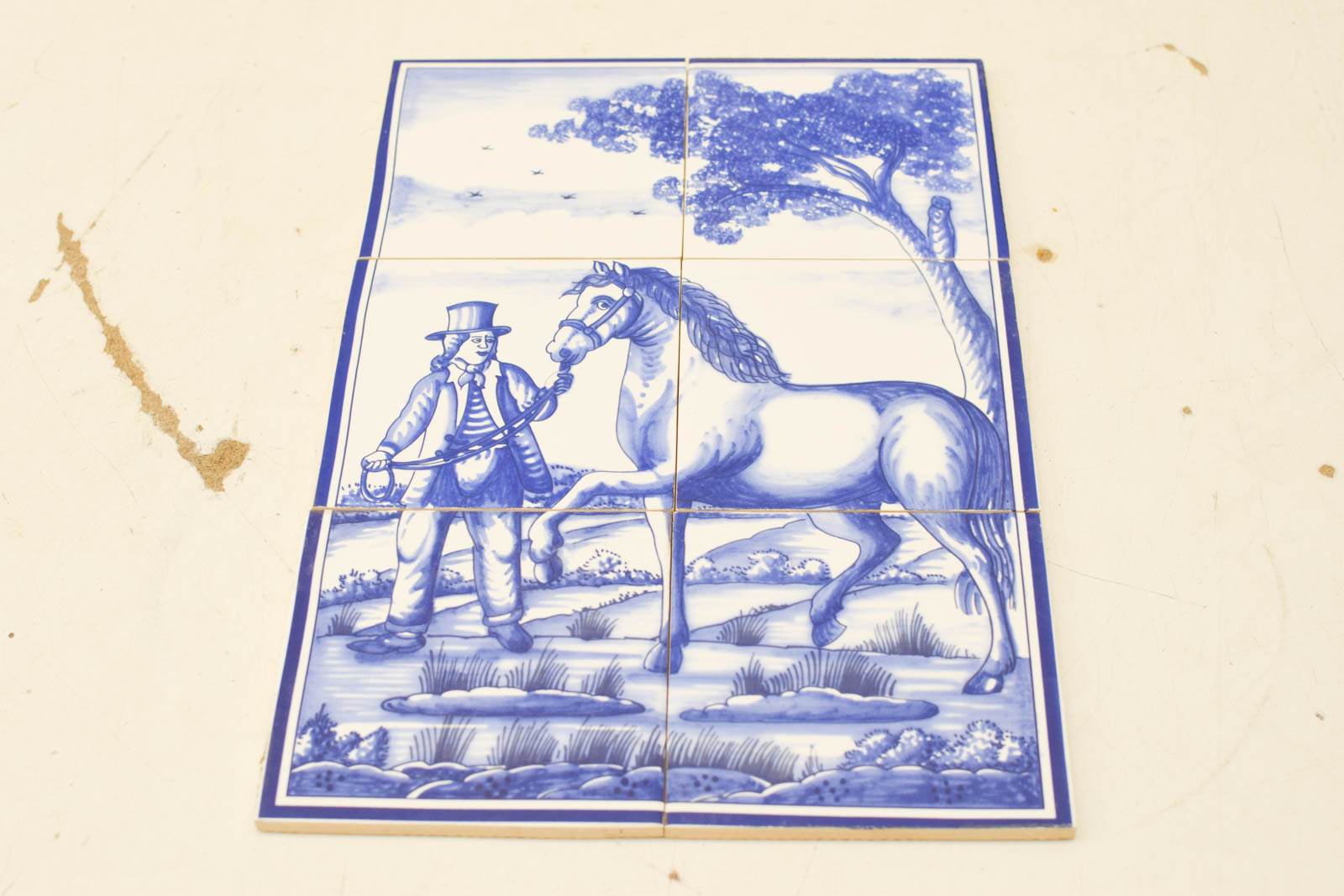 Tegelplateau  met prent van een paard met man  46101