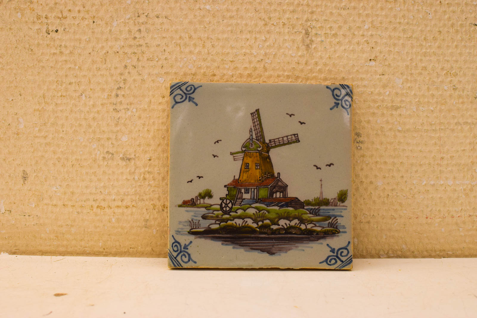 Wandtegel met prent van een molen 49566