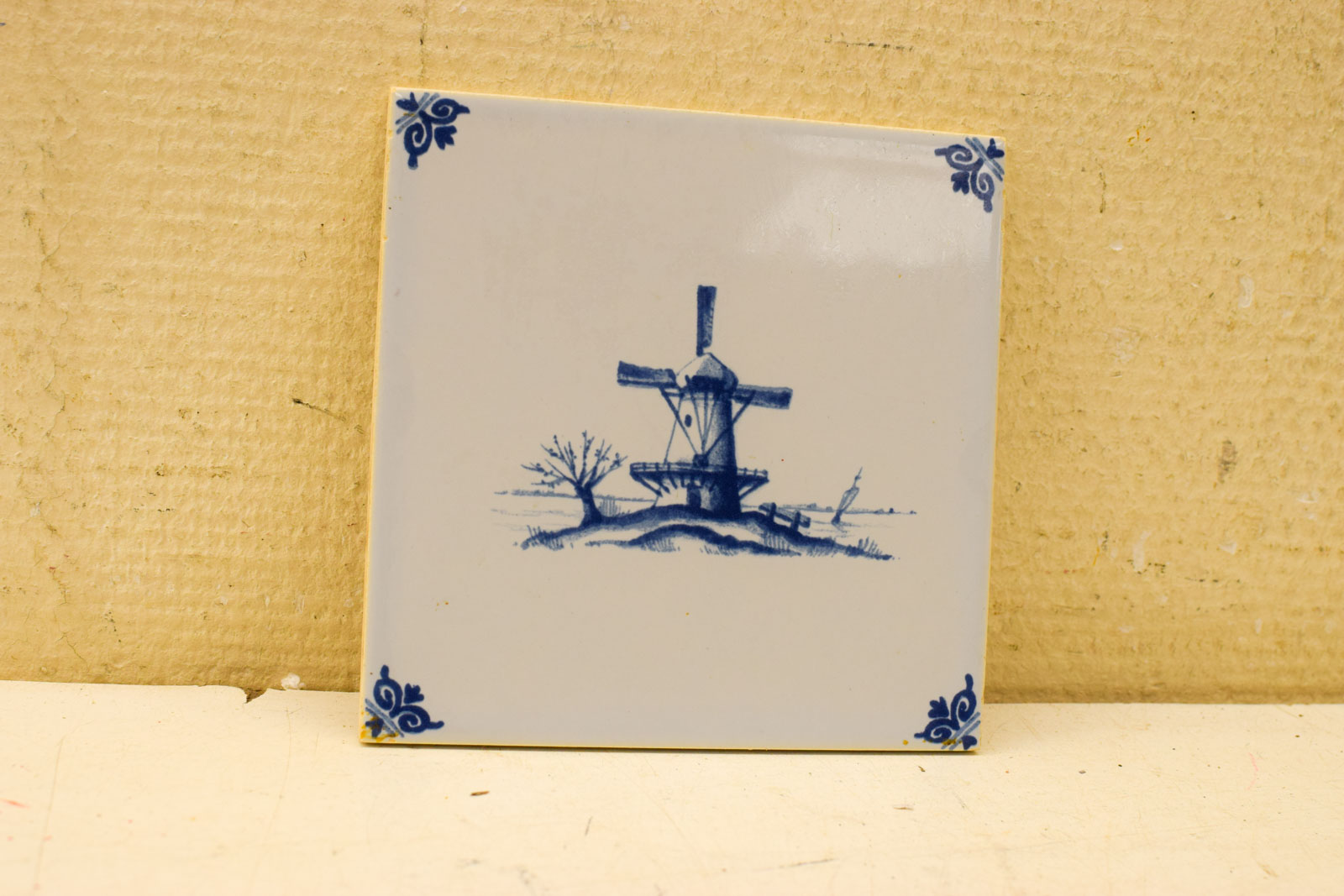 Wandtegel met prent van een molen 49592