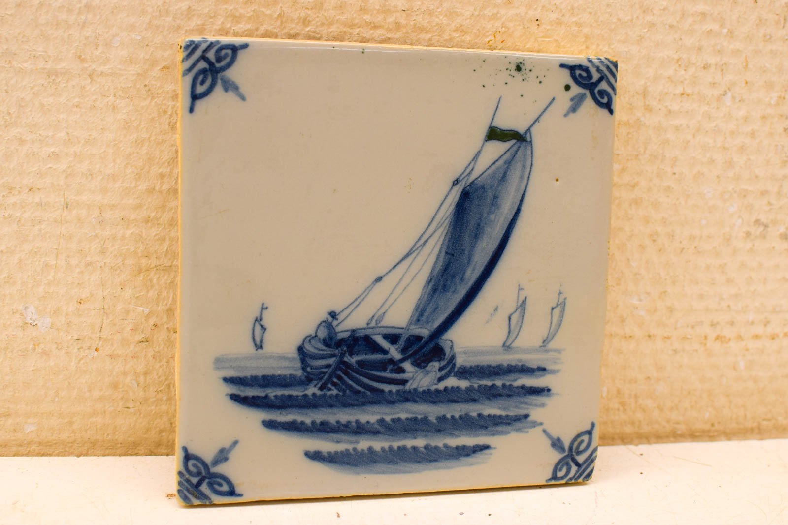 Wandtegel met prent van een boot 49599