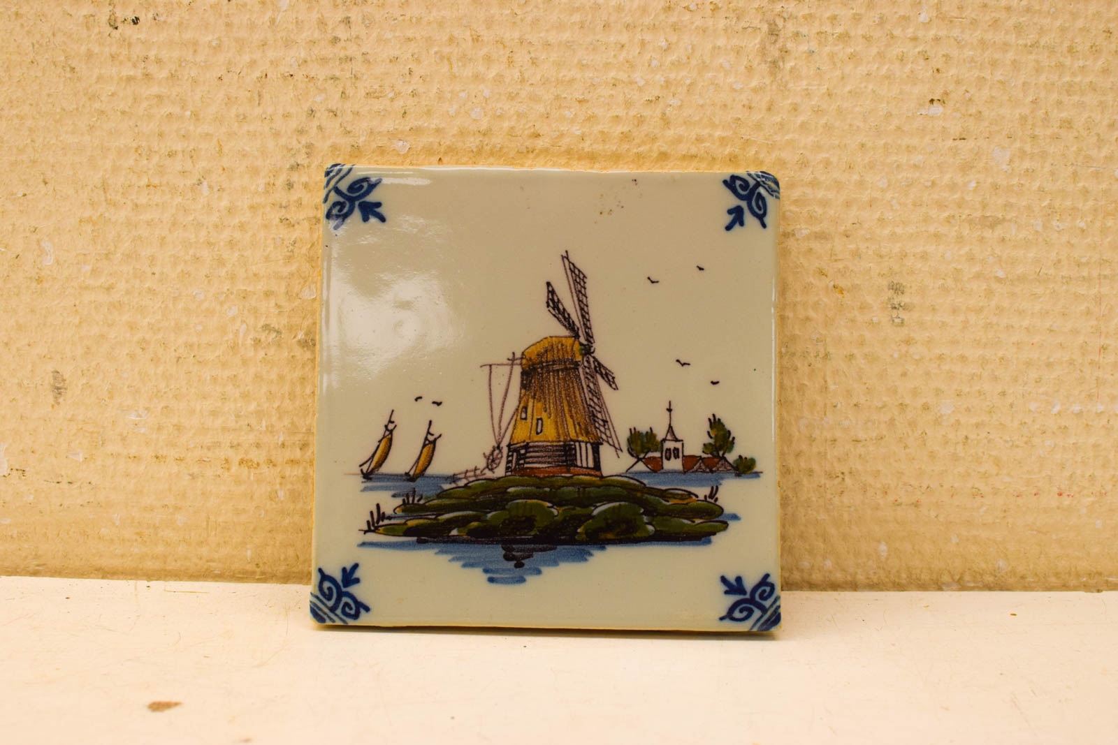 Wandtegel met prent van een molen 49623