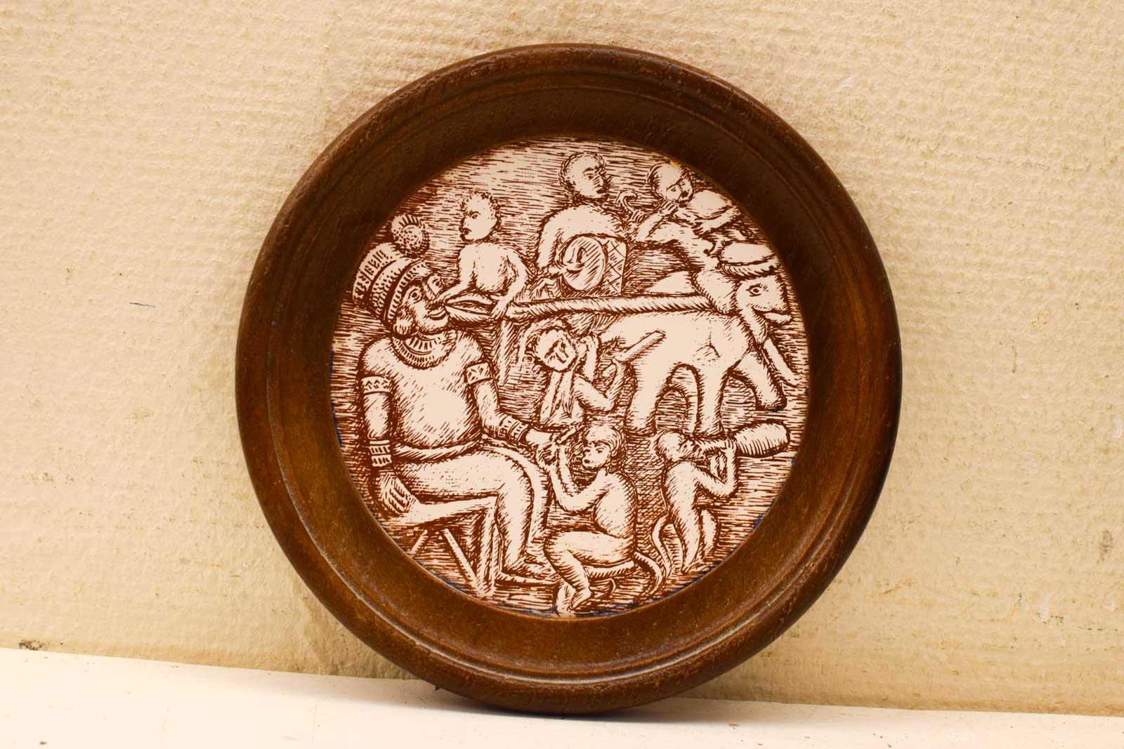 Wandtegel ingelijst in een ronde lijstje 49661