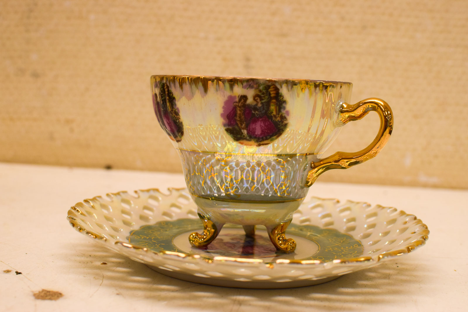 Porseleinen kop en schotel 49668