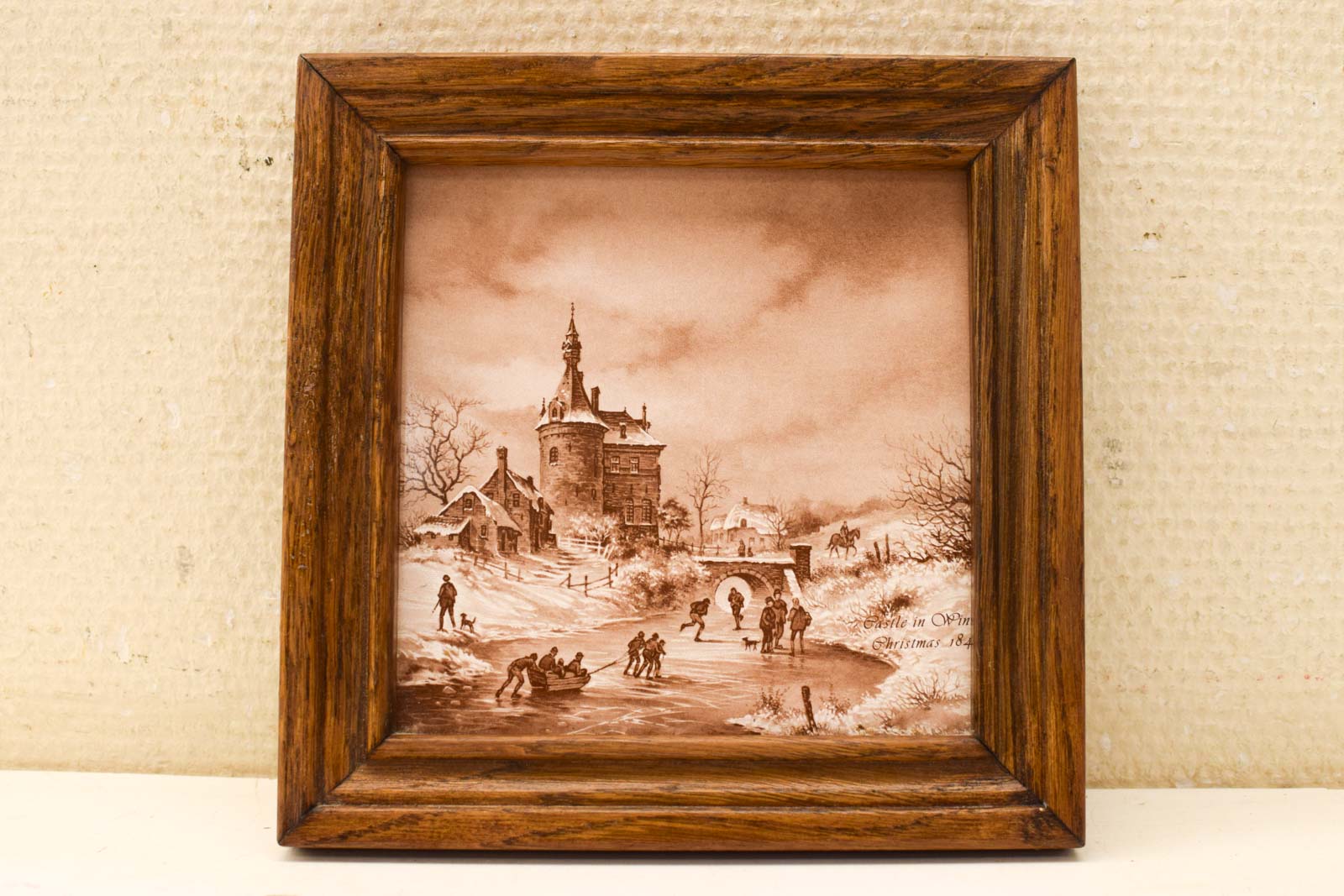 Wandtegel in houten lijstje  49728