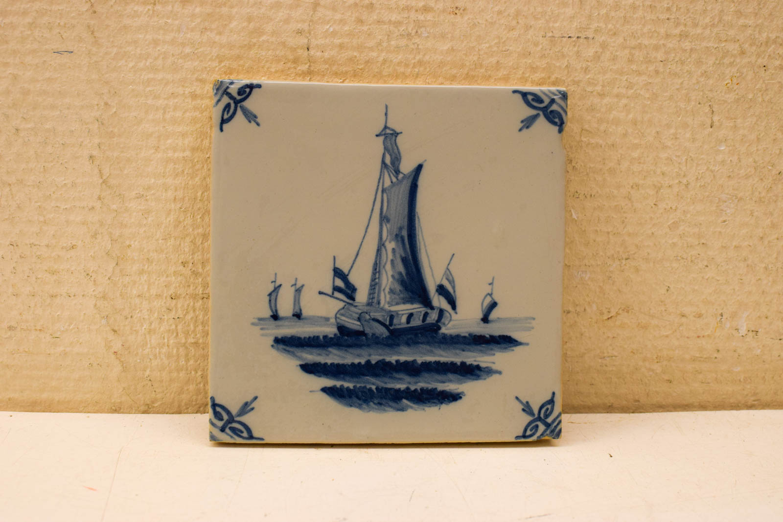 Wandtegel met prent van een boot 49754