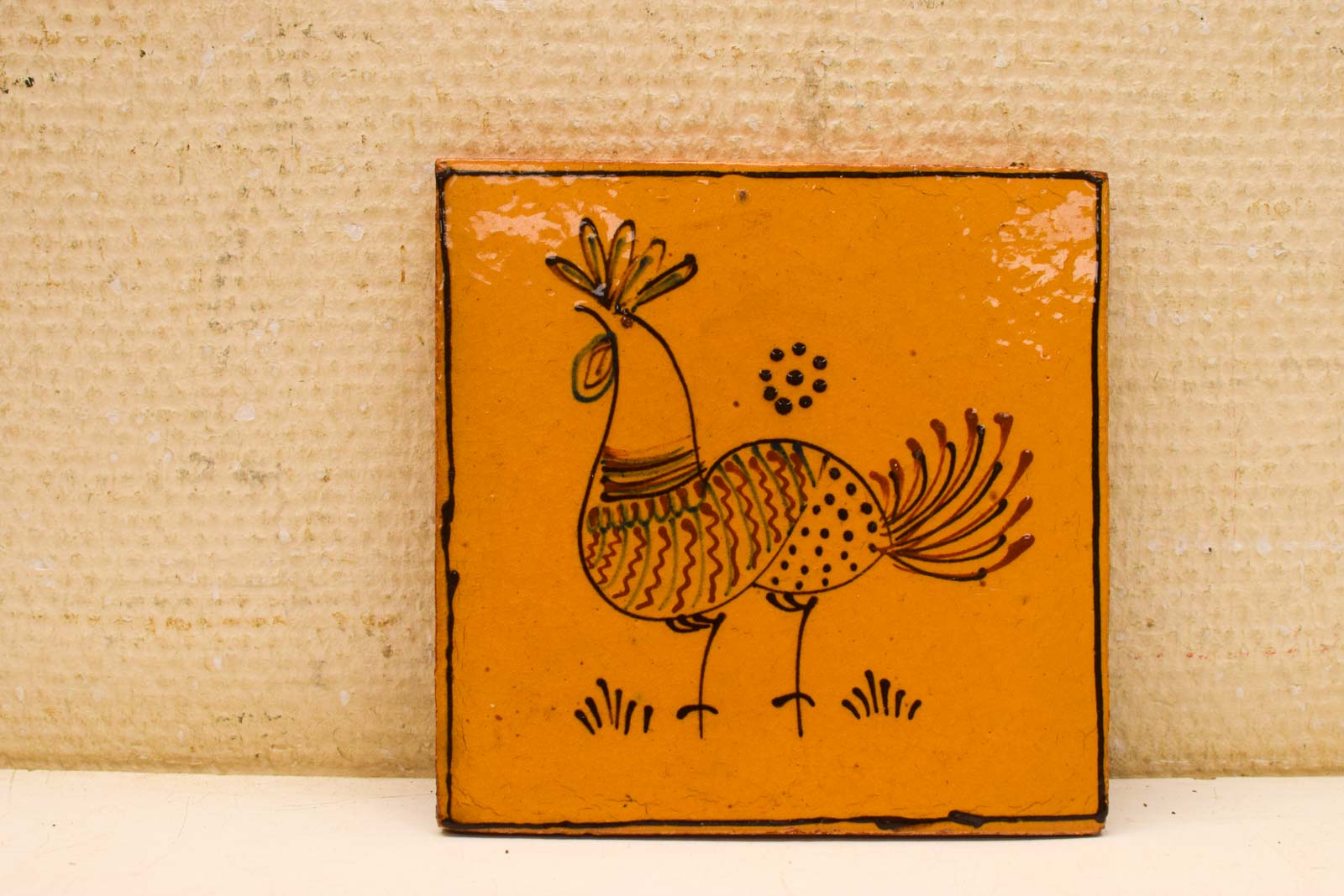 Wandtegel met prent van een haan 30395