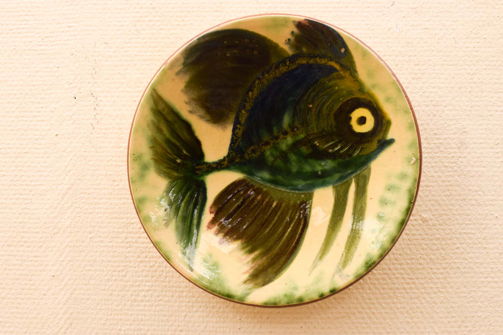 Wandbord met een prent van een vis  50401