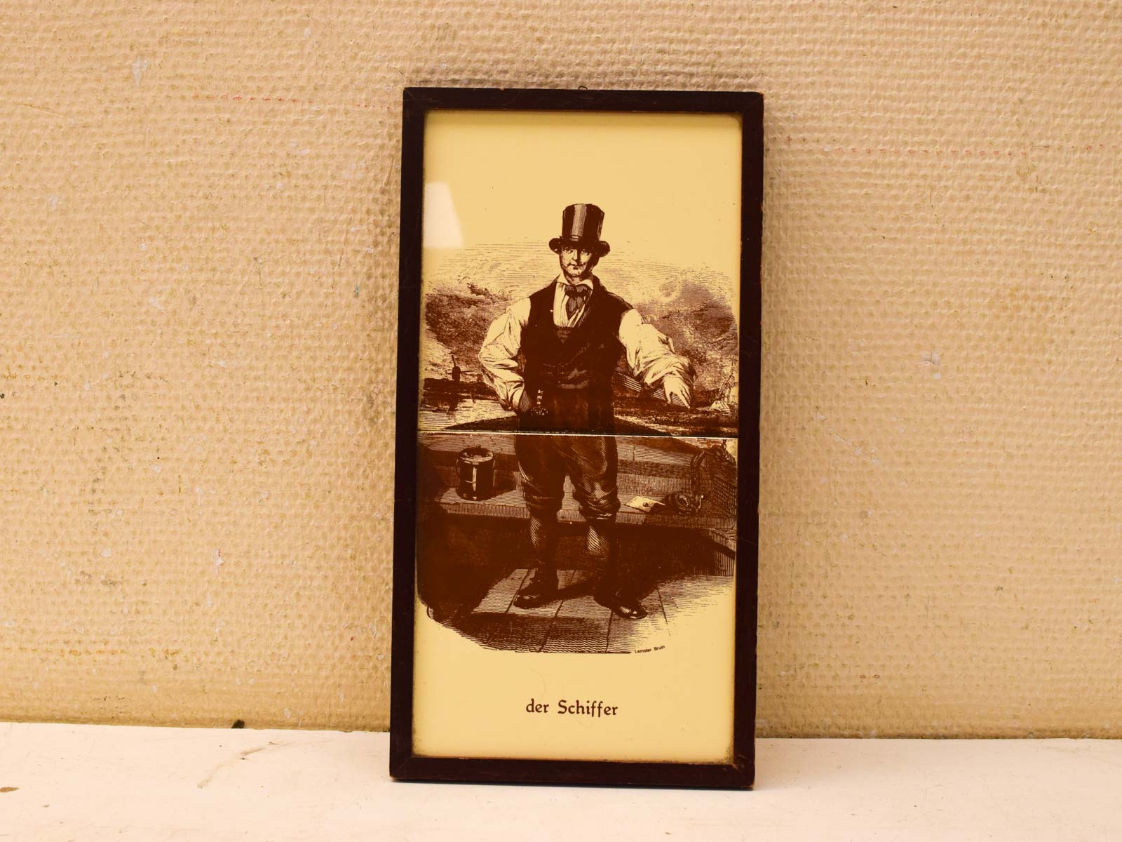 2 wandtegels in een houten lijstje  51314