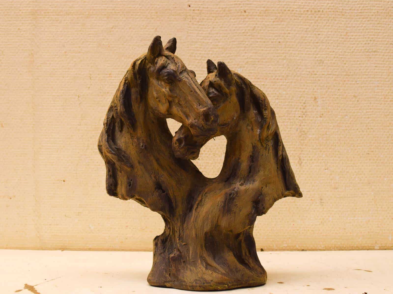 Beeld van 2 paardenhoofden 52890